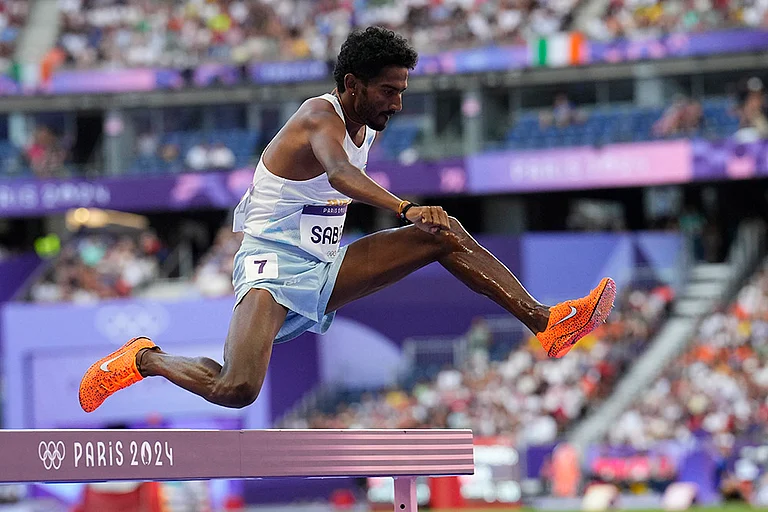Avinash Mukund Sable competes in the men's 3000-meter steeplechase heat - | Photo: AP/Petr David Josek